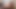 かわいい女の子が裸でタバコを吸いながら小さなクリトリスを弄っている