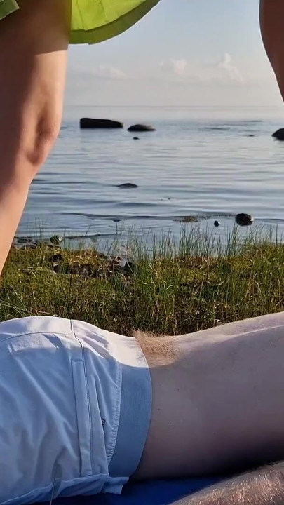 Foot massage by girl with long toes, long slim legs in skirt | Clip 2