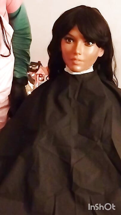 Ebony sex doll Nikki wears barberette capes