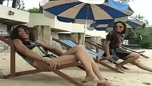 2 sexy Latina's presenting latex fetish in the pool and on the beach