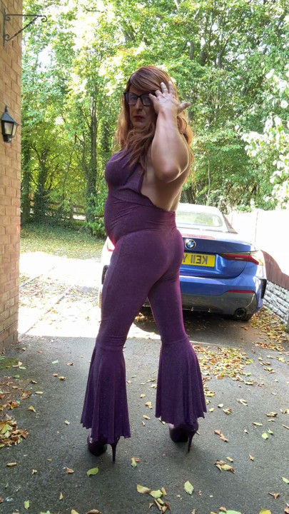 Sexy Crossdresser kellycd2022 in purple catsuit and heels | Clip 1