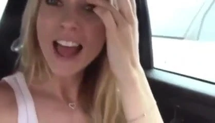 Naughty blonde plays in parking