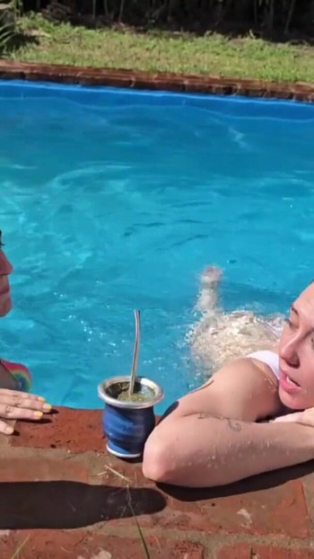 Stunning moment from "Two degenerates fuck in the pool while the neighbors see everything. ARGENTINE LESBIAN"