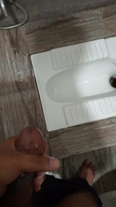Masturbating