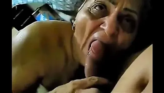 Very Old Brazilian Whore gives a Blowjob