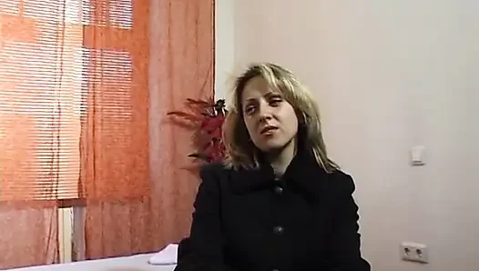 Busty blonde showing her body