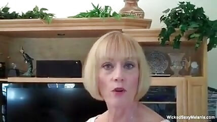 Blonde grandma is tugging and sucking cock in POV