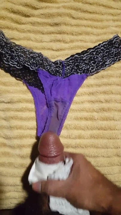 cumming on black and purple panties