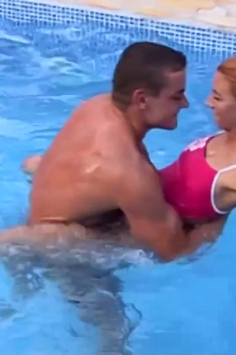 Amazing ginger babe is pleasing her bf's cock by the pool
