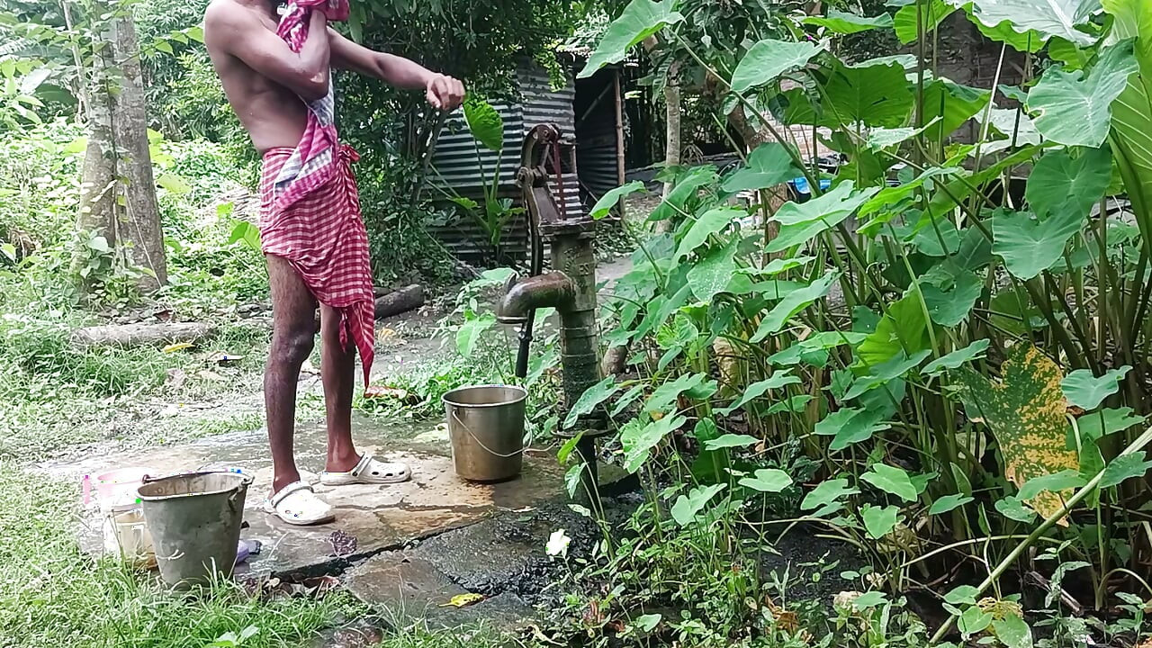 Tha naked Indian mature man shower in open place and showing body and dick..