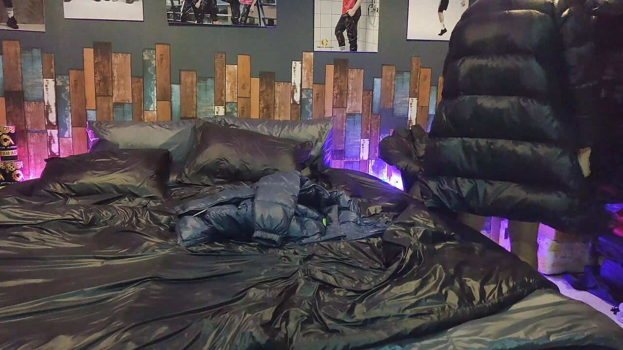 Cock Rubbing Down Jacket on Shiny Nylon Bed