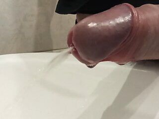 Close-up – peeing from uncut cock