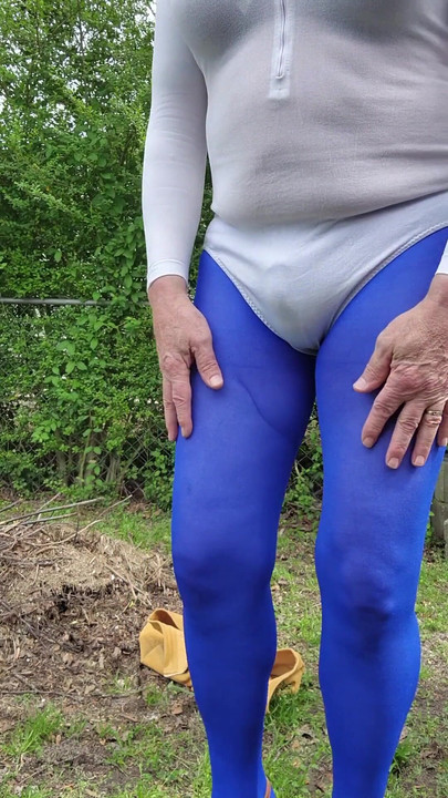 Key moment from "Gay Sexy Cd outdoors teasing and caressing myself in nylon tights, leotard, miniskirt."
