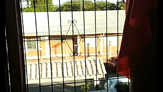 My stepmother trimming her hair and showing off to the street, filmed and sent me and asked if it was good.