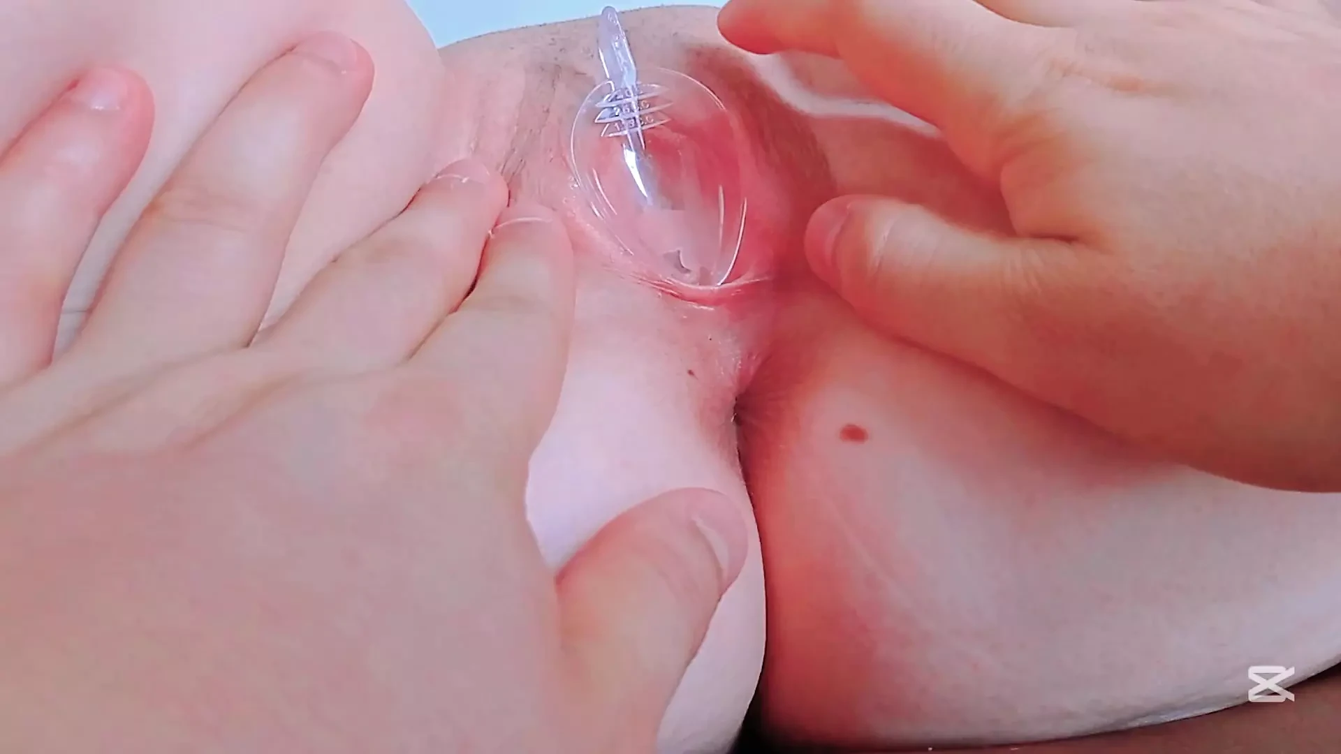 taking a sample of her pussy fluids using a spoon
