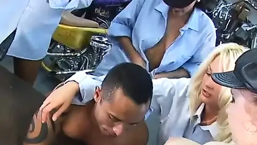 Biker guy sucks and takes strap-ons from bitches
