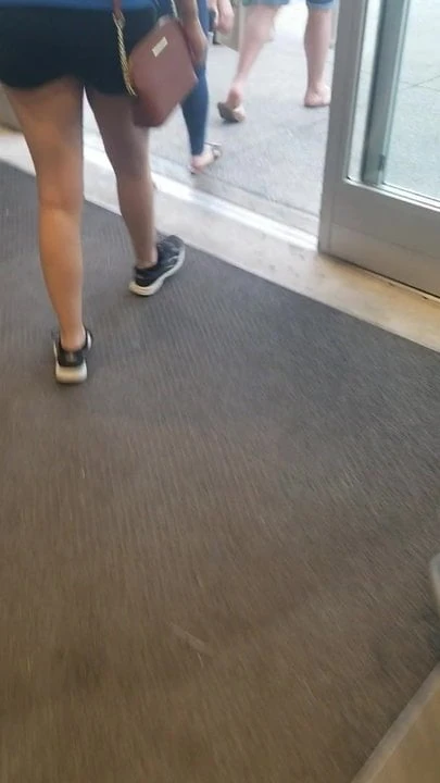 Hot legs walking out of Whole Foods