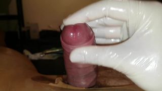 Slow handjob with latex gloves and urethral sounding