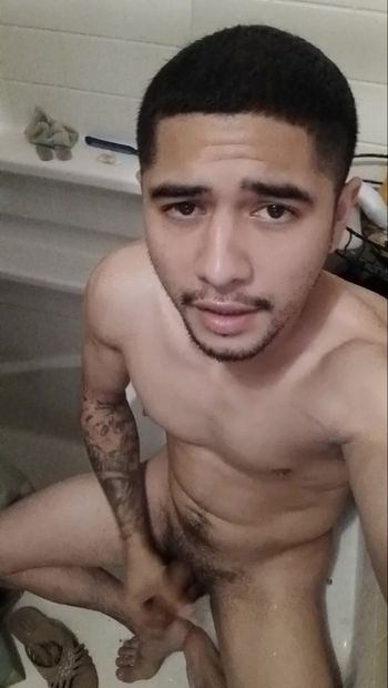 Young latino male jacking off