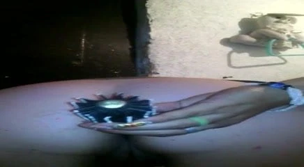 Doggystyle anal masturbate with a brush