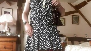 In polka dot dress for a day