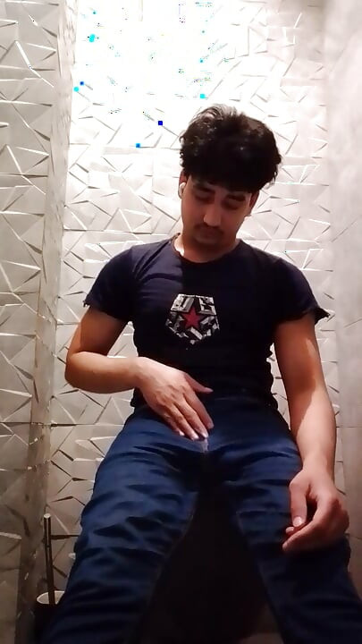 Indian Handsome Boy While His Hard Penis Is Erect and He Strokes His Hand Again in the Toilet Video