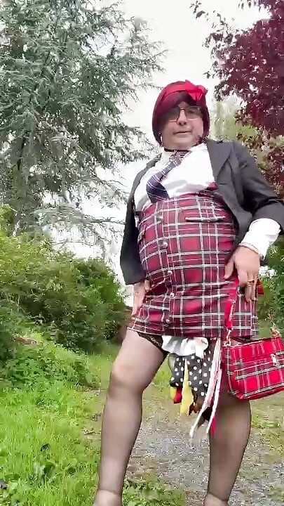 Dressed in a little plaid suspender skirt for an evening