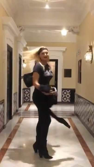 Sophie Turner in a hallway