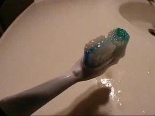 Cum on her Toothbrush
