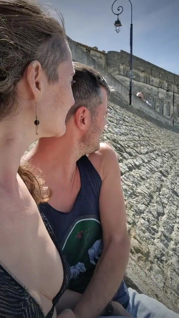 Key moment from "Making out in Arles (France) & fingering her wet pussy - Public Nudity"