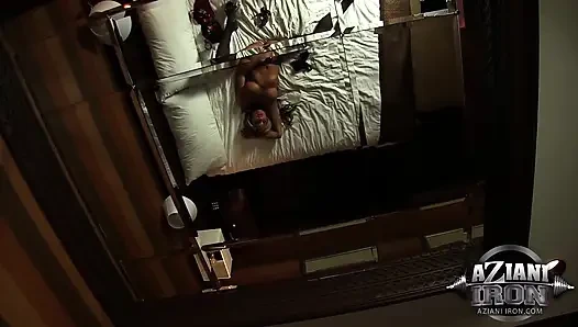 Blonde cougar Abby Marie fingers her pussy on bed while wearing fishnets