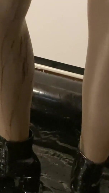 Iconic moment from "Spandex, Nylons, Heels Pissing and Masturbation Bondage"