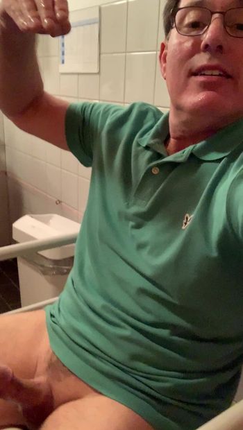 Quick cumming in the public bathroom at the mall. I jerk-off on toilet and cum.