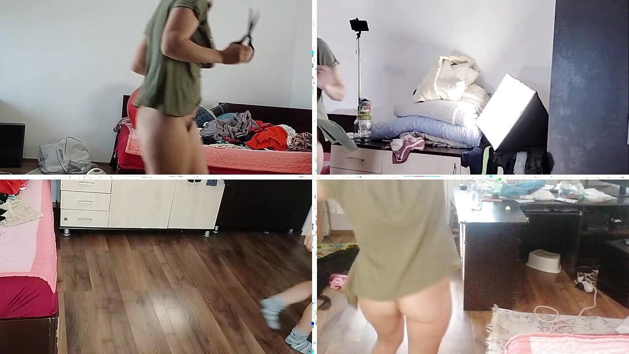 Amateur wife dancing naked at home. Amateur woman has fun trying on clothes and cutting them