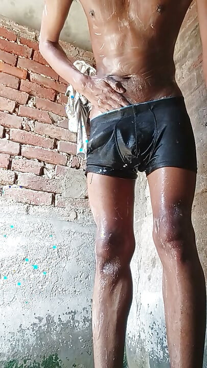 Skinny indian twink boy wet nude bathing
