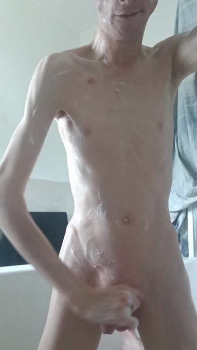 Nude bi chav washing himself while rock hard cock stiff wet through  all on show