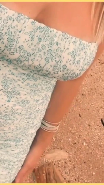 Captivating moment from "Wifey heads out in a tight dress with no panties flashing her tight pussy"