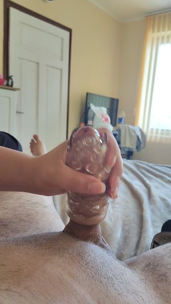 Wife giving a handjob with fake pussy ,man wants to cum