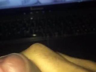 Stroking my cock as I watch a Tranny masturbate her cock
