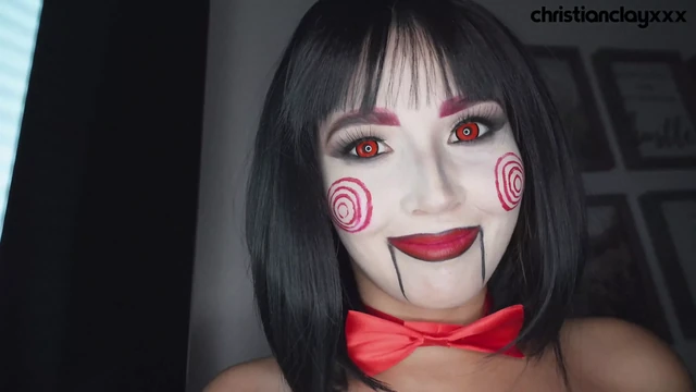 Agatha Vega dressed as Saw the Riddler plays with Christian
