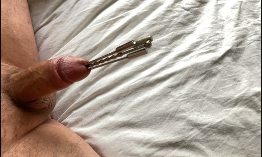 Extreme urethral sounding + cum. Hard oiled cock stuffed full. Multiple sounds and dilators in cock.