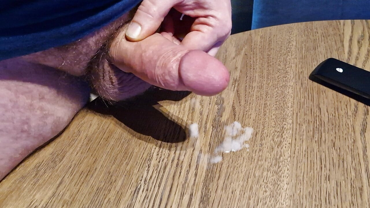 Big juicy dick cumming cum on table with precum load