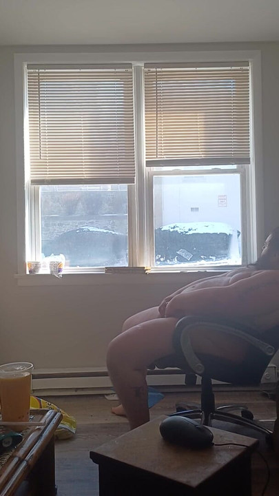 Mofo2121 in front of the window