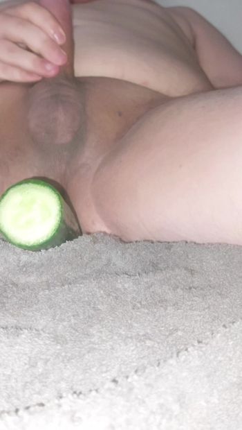 Cumming with cucumber in ass