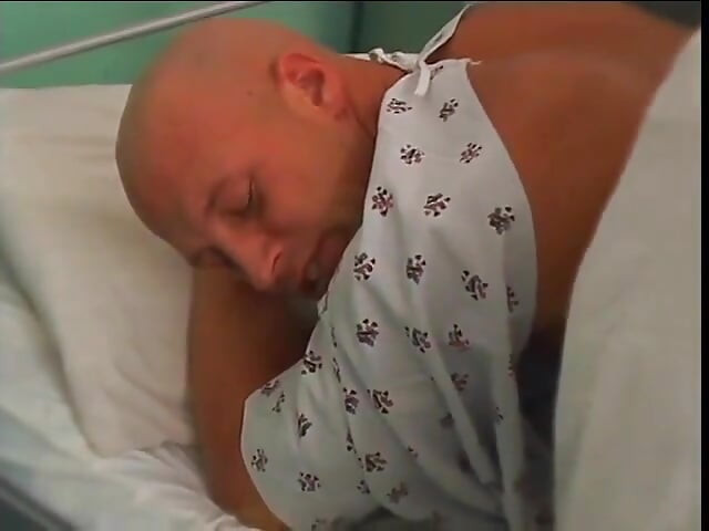 Hot blonde nurse sticks a thermometer in guy's ass in operation room