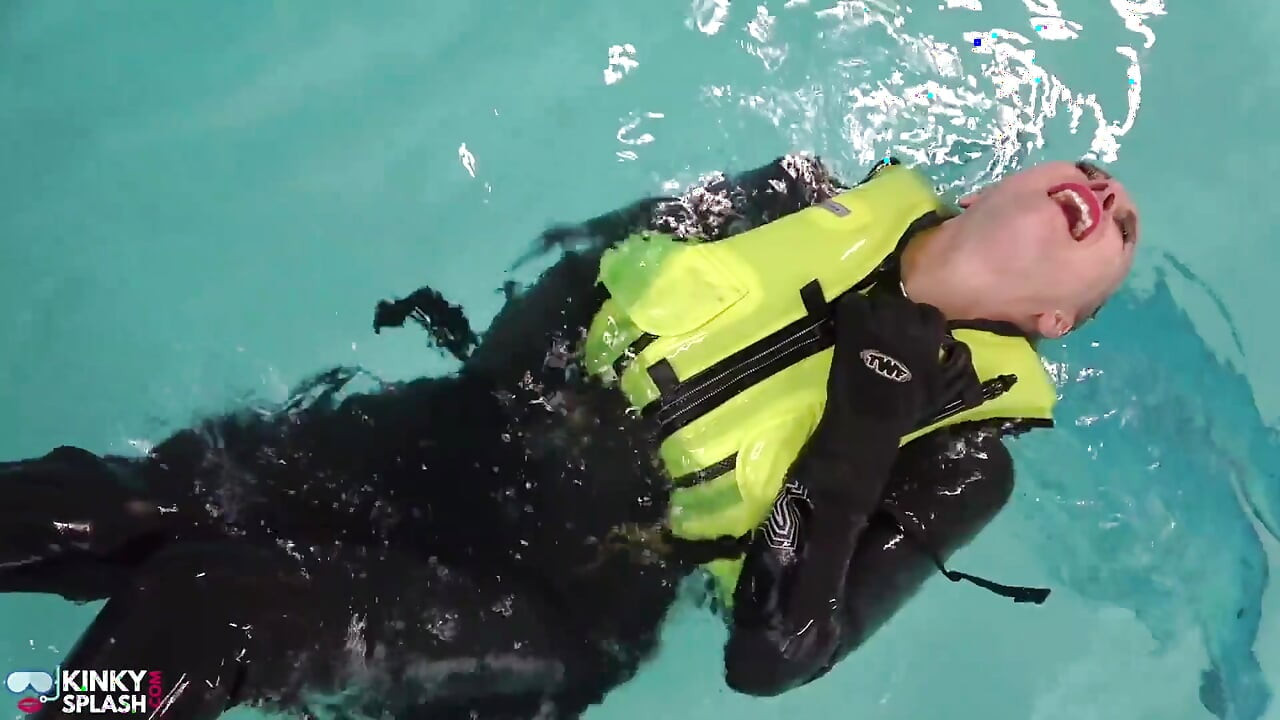 Neoprene Lust: Inflatable Snorkel Vest Pleasure in the Pool