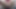 A young woman named Yuuna bares all for a lensman