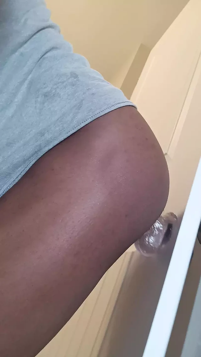 Horny black twink stretching ass with dildo