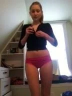 Hot chick strips and plays with herself for you
