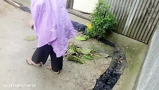 Girl Sweeping the Yard Naked in the Rain - Outdoor Scene